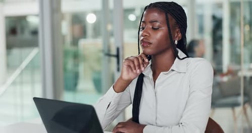 Laptop, typing and thinking with business woman in office for reading, manuscript editor