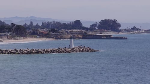Aerial View of Santa Cruz Lighthouse and Coastline on a Sunny Day