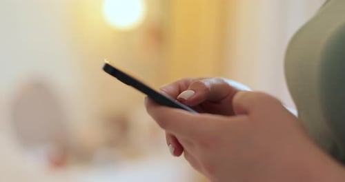 Woman Using Texting Mobile Phone or Chat in Home Morning Close Up of Young Woman Hand Technology