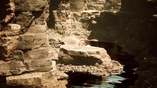the River Flowing Through the Valley of Huge Red Rocks