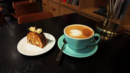 Delicious Cake and Latte on Table