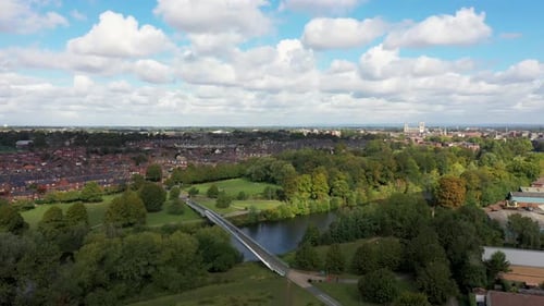 Aerial drone footage of the famous Millennium Bridge which is a footbridge that runs over the River
