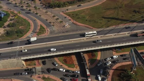 A tramway in casablanca driving under a bridge