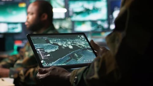 Men Working With Tablet and Data in Dark Room