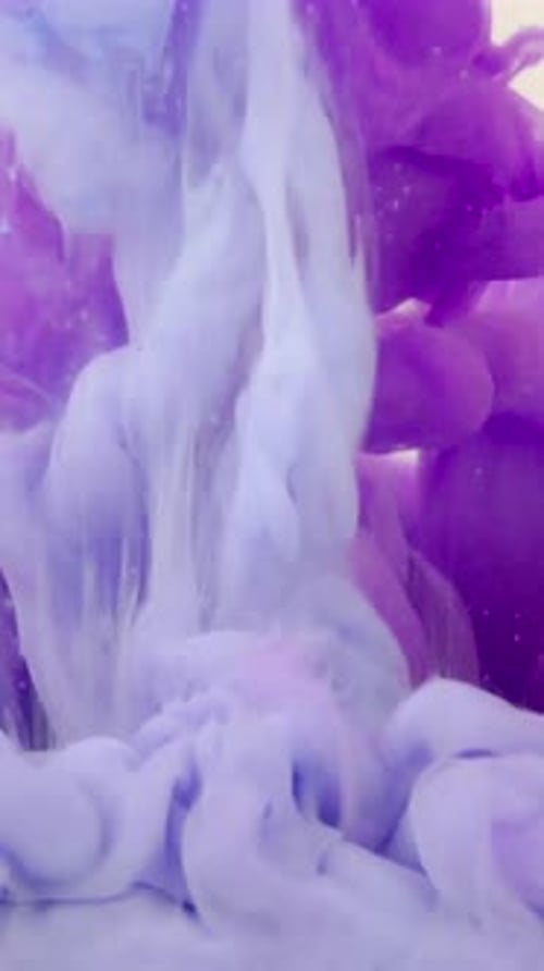 Abstract Purple and Blue Ink Swirling in Water