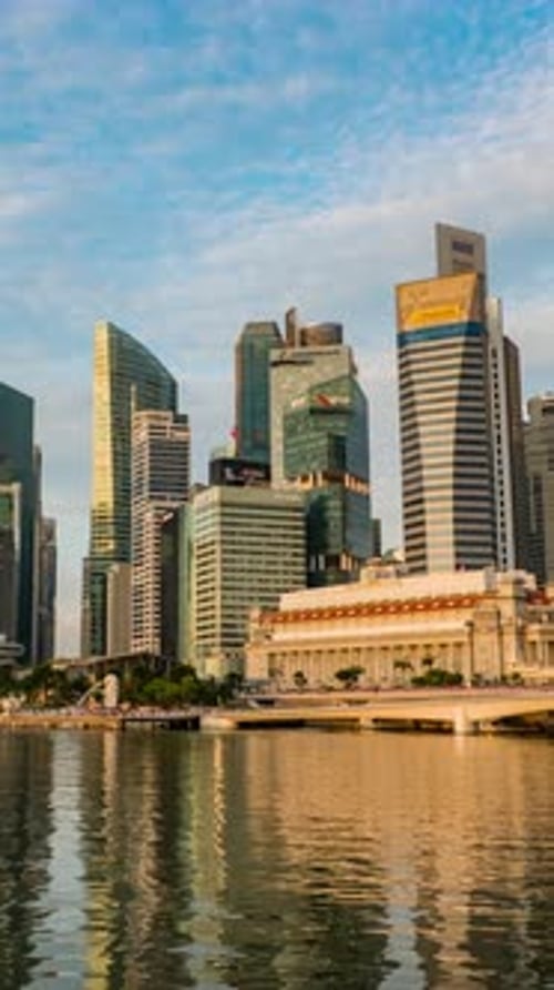 Singapore Central Business District transform from dawn to sunrise time lapse video.