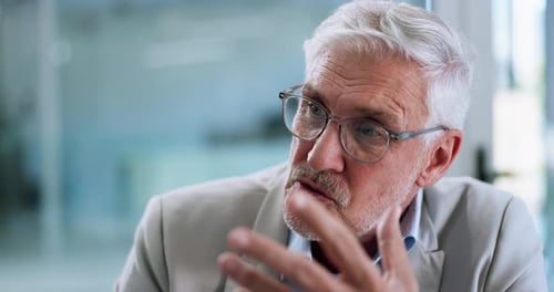 Video call, talking and mature with business man in office for webinar, virtual conference