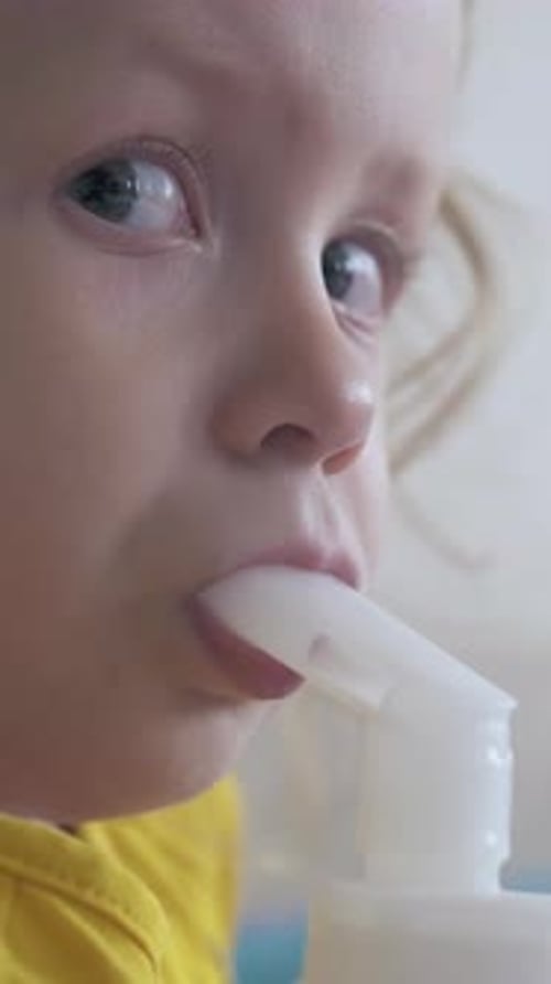 Tired Girl Undergoes Medical Procedure with Inhaler in Room