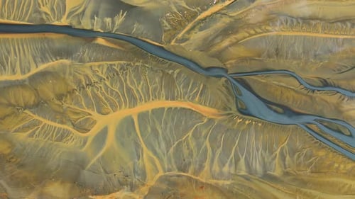 Abstract aerial view of colorful acid mine water drainage in decanting lake. Natural background