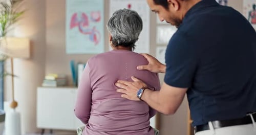 Physio, back pain and elderly patient in clinic, consultation exam and medical support