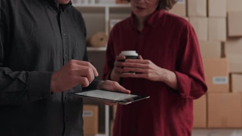 Two Colleagues Of The Entrepreneur At The Workplace Are Having A Consultation Conversation At Depot