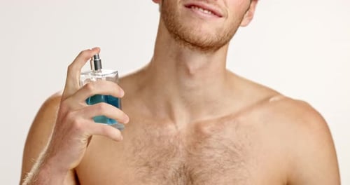 Neck, hands and man spray perfume for hygiene, grooming or fragrance on white studio background