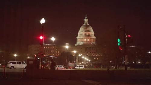 US Capitol Lit Up at Night with Security Barrier Before Joe Biden Inauguration, Washington D.C.