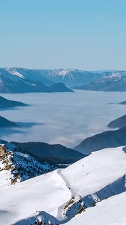 Vertical Aerial Timelapse of Beautiful Cloudscape in French Alps Valley