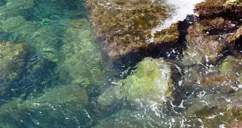 Waves Hitting The Shore In The Coast Of Spain