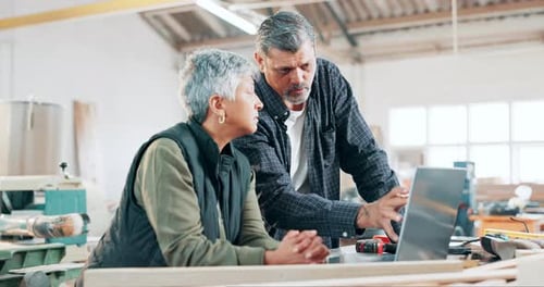 Woodwork, people and carpenter with laptop in workshop manufacturing or engineering project