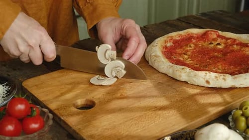 Slicing Mushrooms for Pizza Topping Preparation