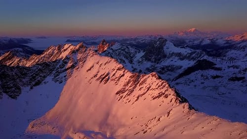 Aerial flight above stunning Alps.