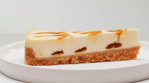 Close-up of Delicious Cheesecake Slice on Plate