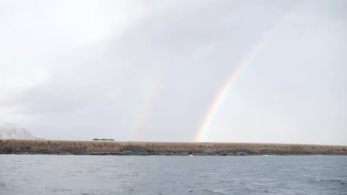 Yacht Club with Sunset and Rainbow Background