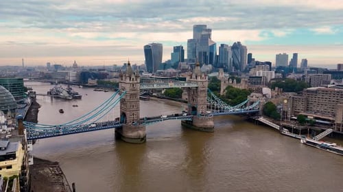 A breathtaking aerial descent unveils London's iconic Tower Bridge, standing proudly over the Thames