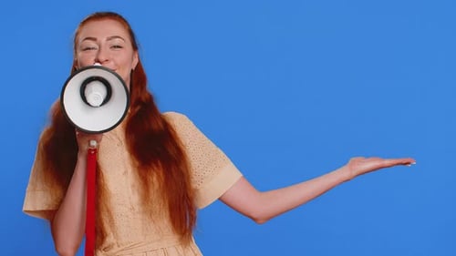 Woman Talking with Megaphone Proclaiming News Loudly Announcing Advertisement Pointing Empty Place