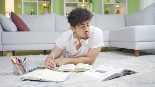 Young man bored and depressed at home.