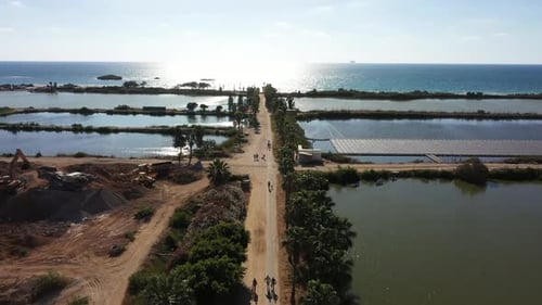 Aerial video over fish ponds and coastline in Jisr az Zarqa Israel