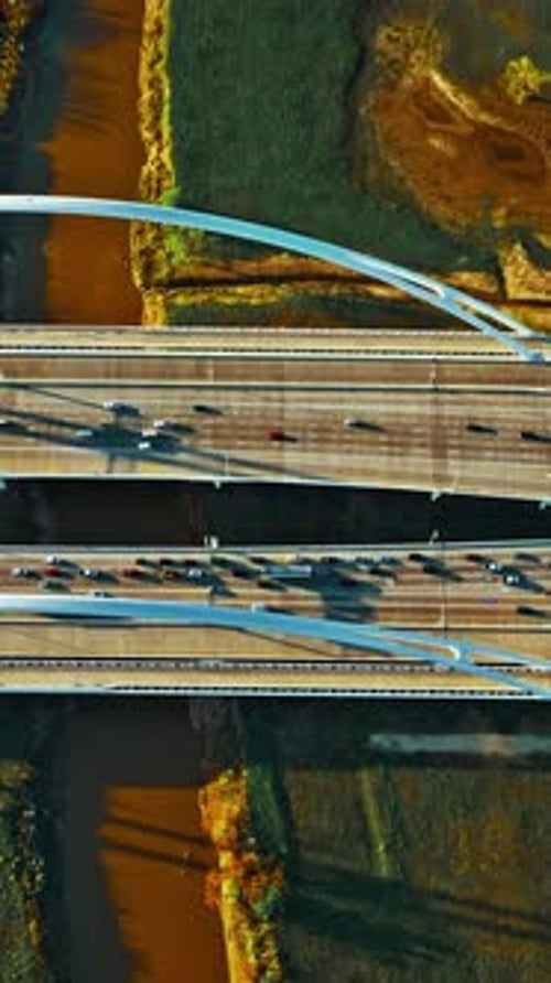 Aerial view of urban traffic flow over river in Dallas, USA