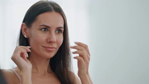 Smiling Girl Putting Accessories Apartment Close Up Happy Woman Looking Mirror