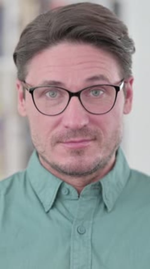 Middle Aged Man Shaking Head as Yes Sign, Vertical Video