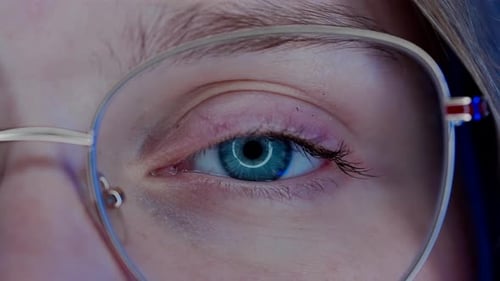 Extreme Close Up of Eye Looking at Screen