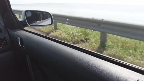 Crossing the river by the bridge inside car POV
