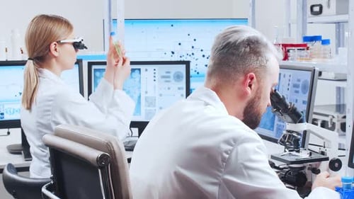 Scientists Work in Modern Medical Research Laboratory