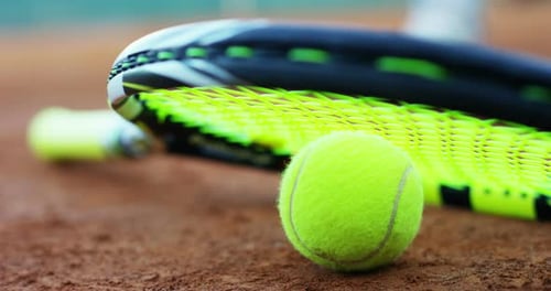 slow motion of tennis professional racket and field in red soil background with tennis player def