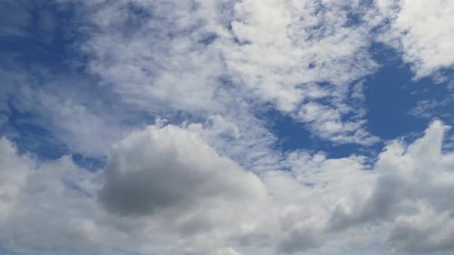 White Clouds Floating in Blue Sky