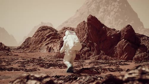 Astronaut Walking On Mars Surface Through Rocky Terrain And Martian Sand 8