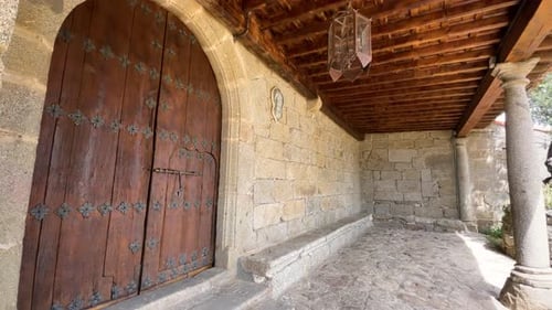 Medieval-style entrance porch of the Sanctuary of Our Lady of Espino, 15th century. Avila, Spain