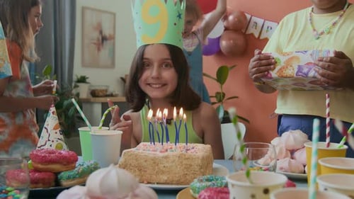 Girl Celebrates Birthday with Friends and Family