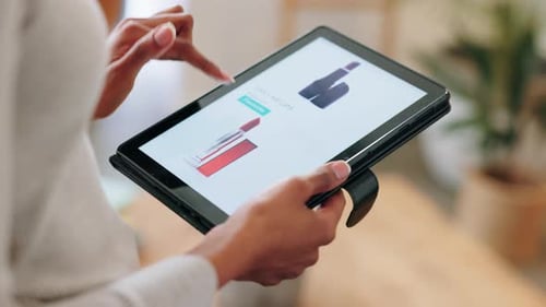 Hands with tablet for online shopping ecommerce cosmetics, beauty and makeup lipstick product sale