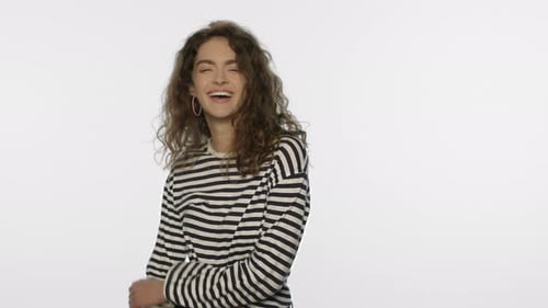 Smiling Woman Dancing on White Background. Portrait of Happy Woman Dance In