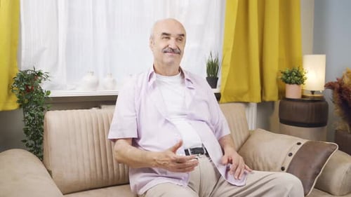 Old man thinking about happy memories.