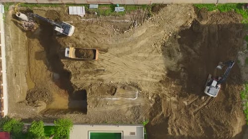 Aerial view of construction site with machinery working