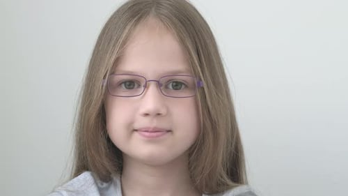 Smiling Child Wearing Glasses Close Up