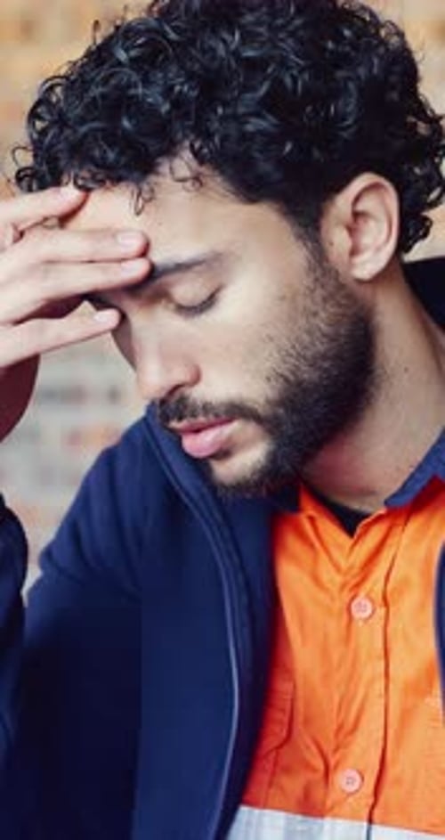 Stress, man and construction worker with headache on site for deadline on repairs