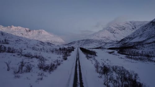 A road through an arctic valley in the far north of Norway.