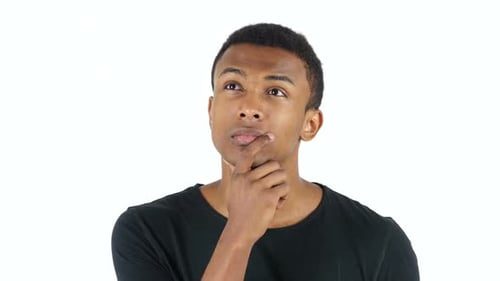 Man Thinking with Hand on Chin in Studio