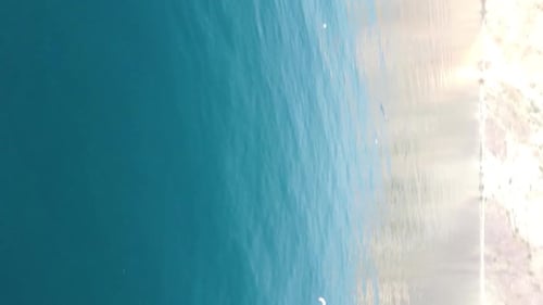 Aerial Panoramic View of Beautiful Sunset Above Sea Beautiful Seascape Sun Glare Small Waves on the