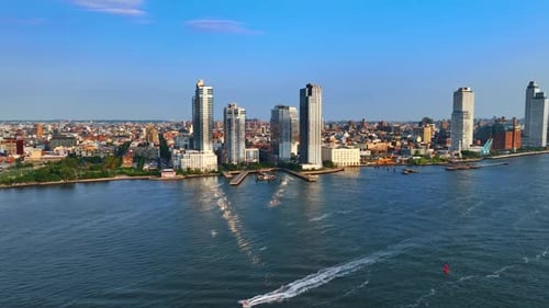 Approaching the high-rise buildings on the waterfront of the East River in Brooklyn.