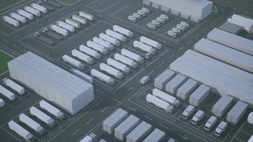 Overhead View of a Large Logistics and Distribution Center with Trucks